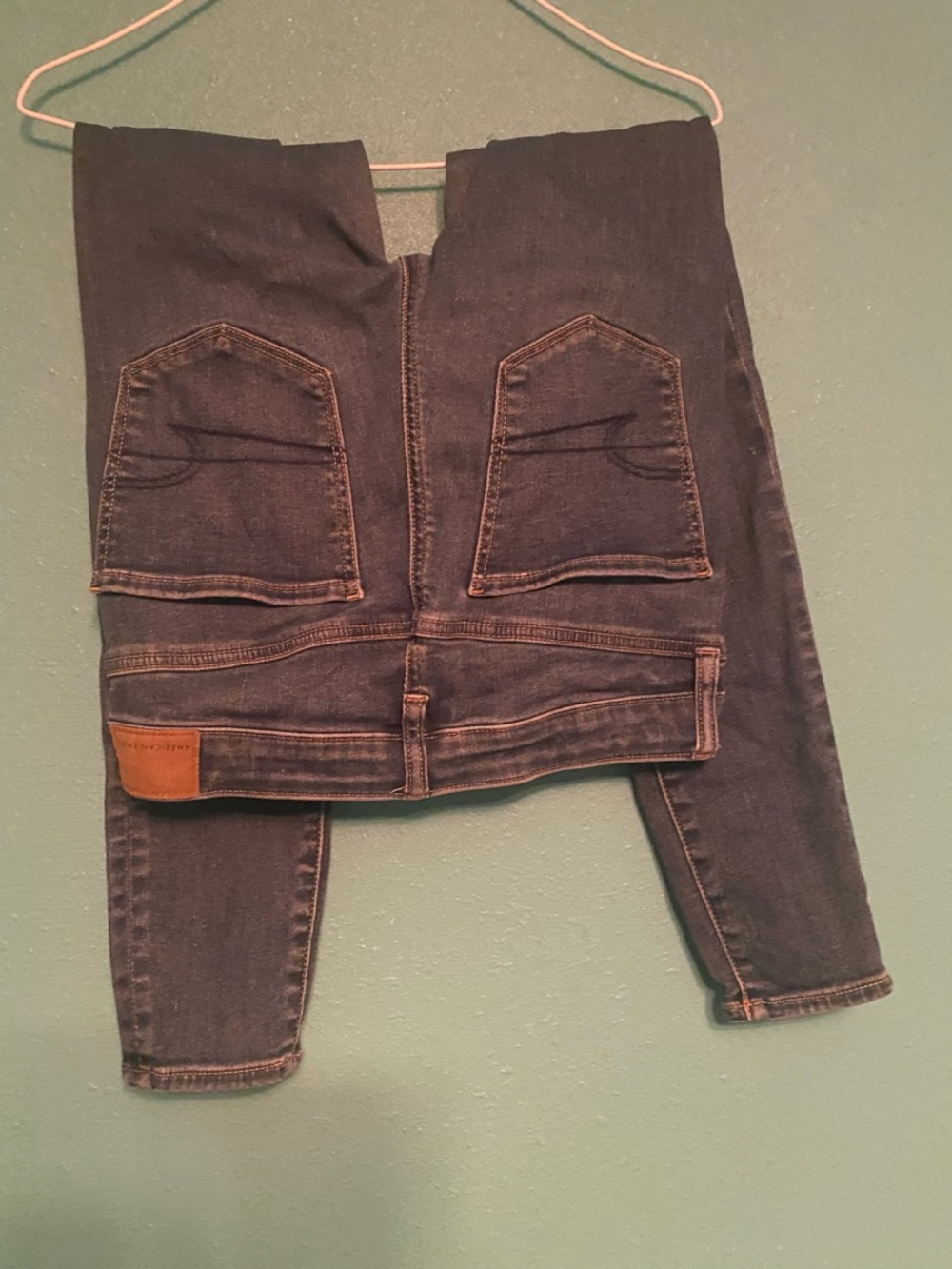 American Eagle womens skinny jeans blue with tan stitching